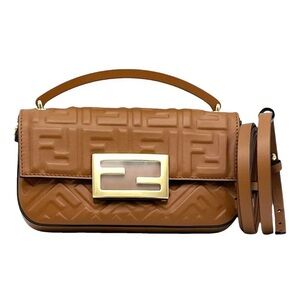 Like new Authentic Fendi Tan Embossed Crossbody Baguette Bag Retails $3850